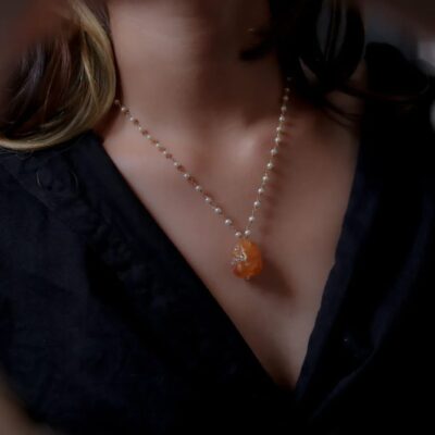 Fine White Pearls Necklace With Orange Middle Stone