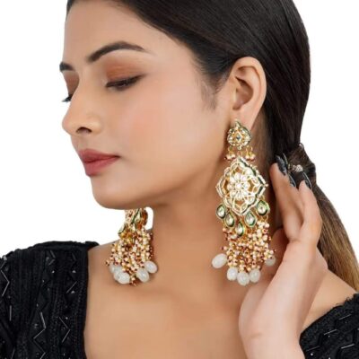 Gold Plated Kundan Floral And Leaf Carved Dangler Earrings