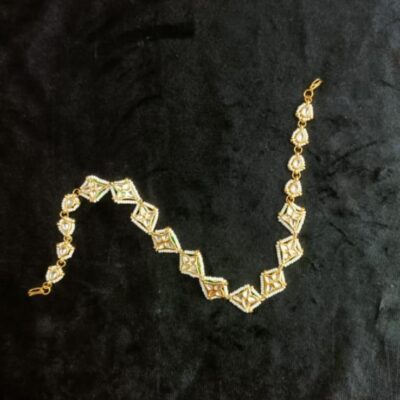 Gold Kundan Embellished Floral Unit Headband Mathhapatti